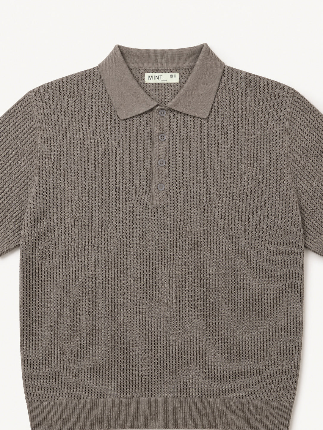 Brown knitted polo shirt on a white background