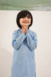 A child wearing a sky blue cotton embroidered kurta trouser