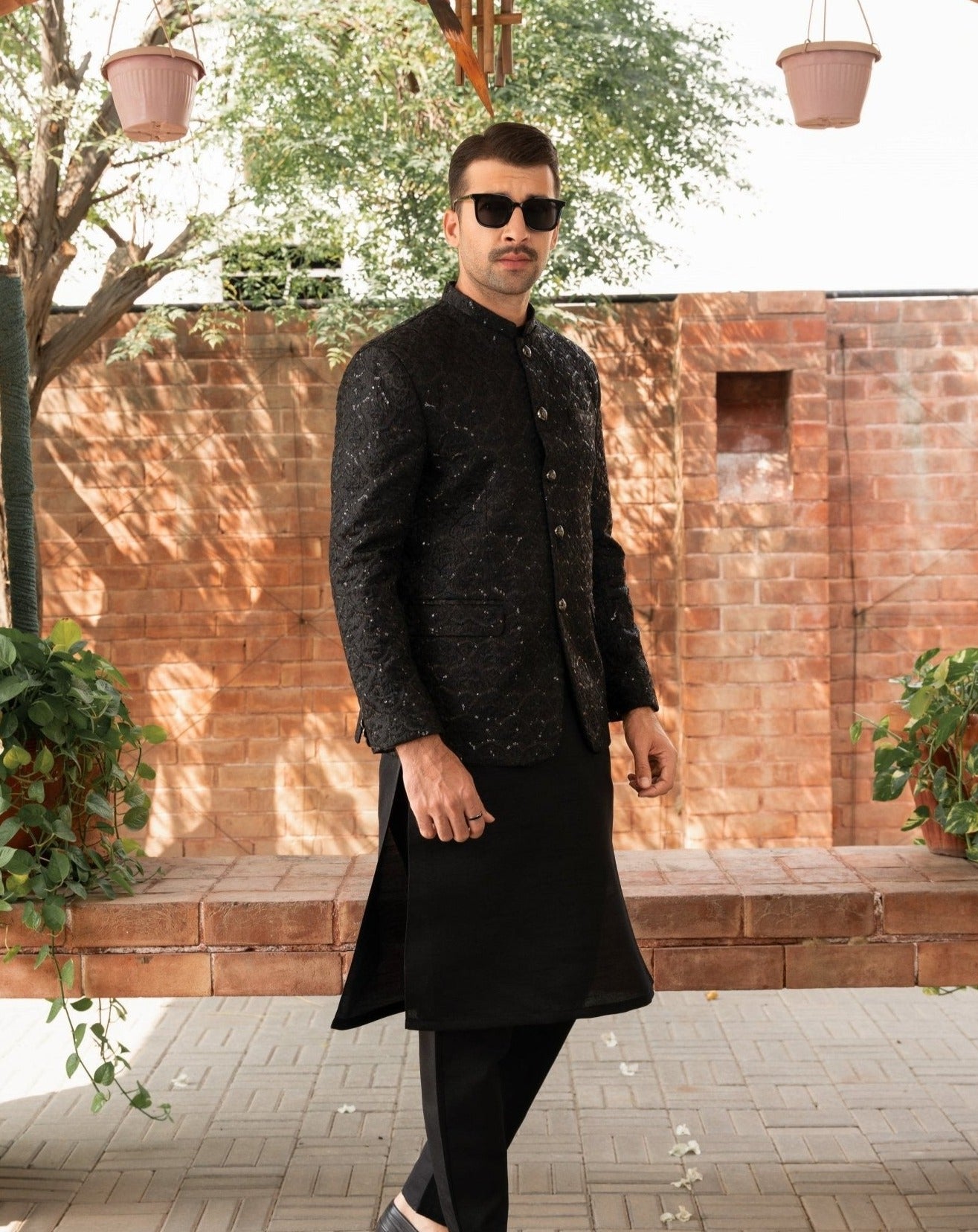 Black coat hotsell mens outfit