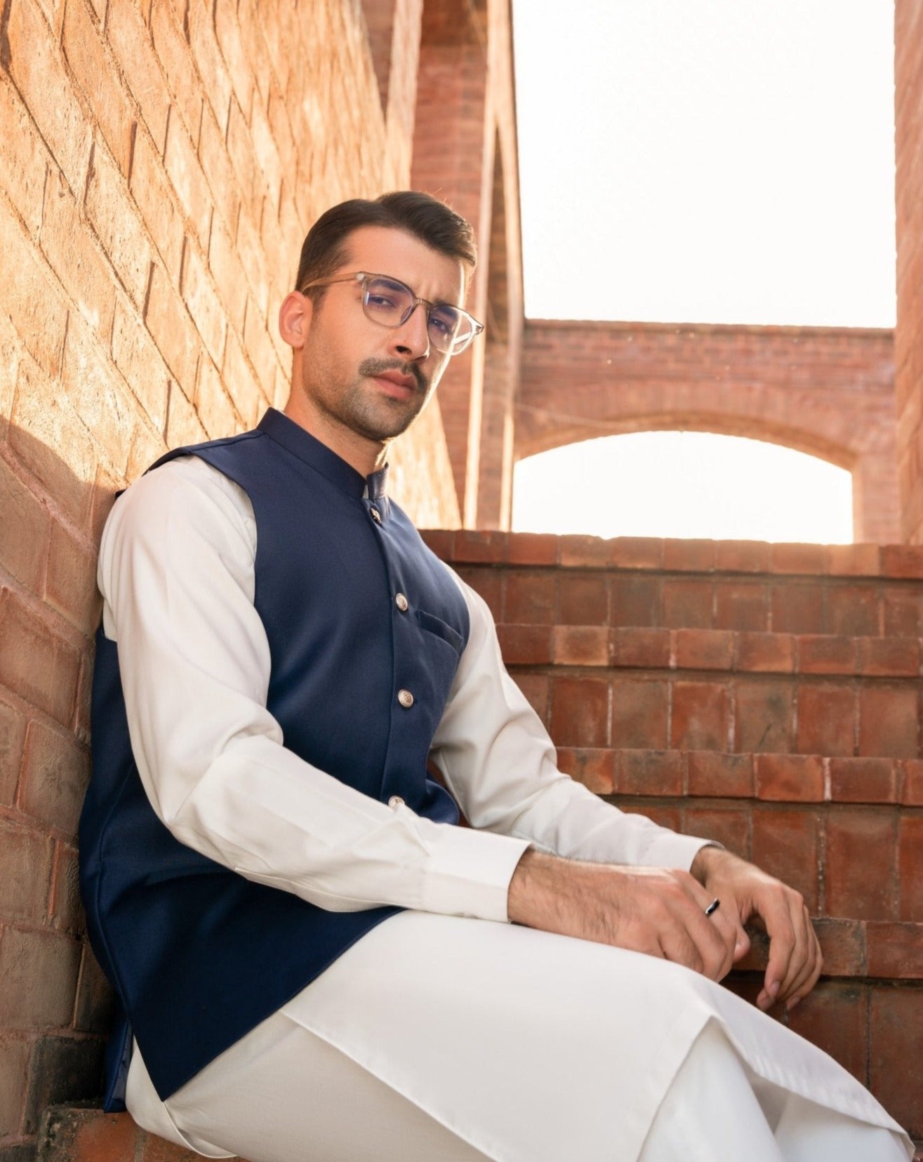 White kurta shalwar with clearance blue waistcoat